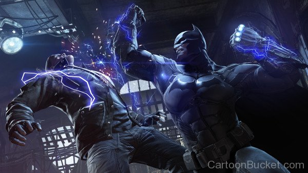 Batman Hitting Shock Gloves Uppercut