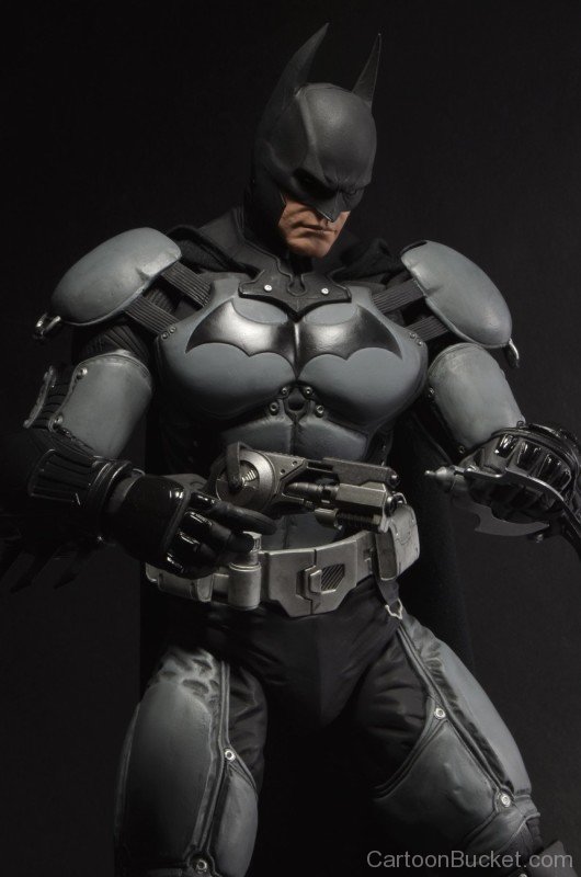 Batman Holding His Gun