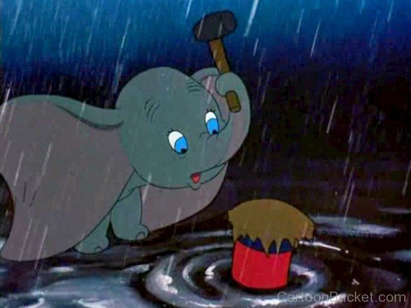 Dumbo Holding Hammer