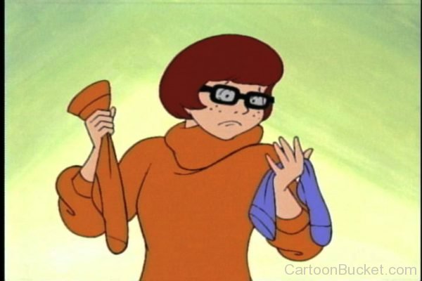 Velma Looking At Hand Towel